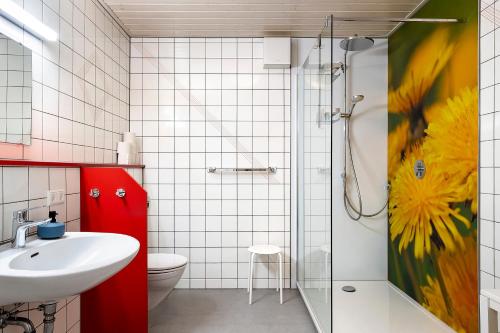 Et badeværelse på Ferienwohnungen Im Löwengründle