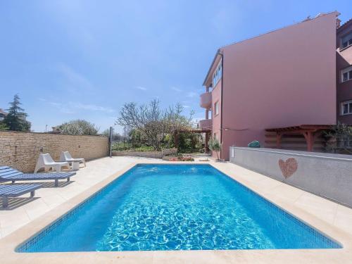 Apartment Wohnung in Fažana mit gemeinsamem Pool und Garten by Interhome