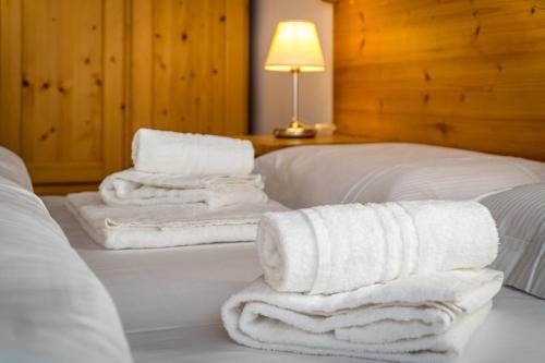 Lova arba lovos apgyvendinimo įstaigoje Camping Dolomiti