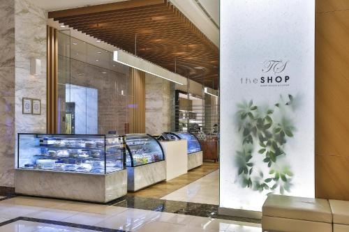 a shop with a display case in a mall at Hotel Hyundai by Lahan Mokpo in Mokpo