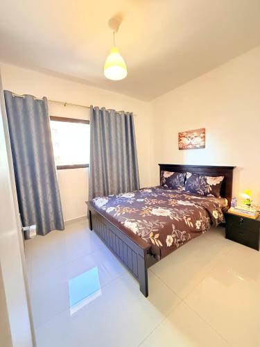 Ένα ή περισσότερα κρεβάτια σε δωμάτιο στο Emira Haven