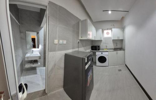 Køkken eller tekøkken på ميرا للشقق الفندقية