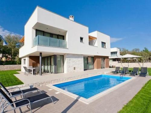 Holiday Home Designvilla mit Dachterrasse und Panoramablick by Interhome