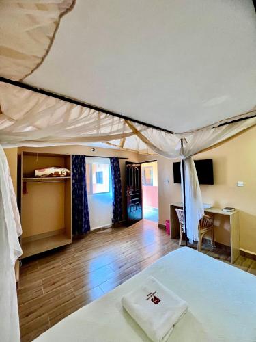 Postel nebo postele na pokoji v ubytování Sweet Lake Resort