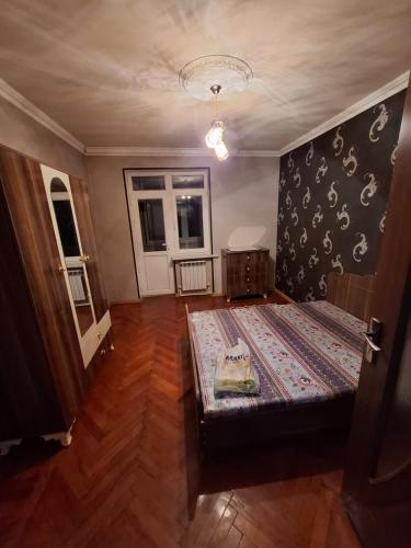 Postel nebo postele na pokoji v ubytování Deniz Hotel