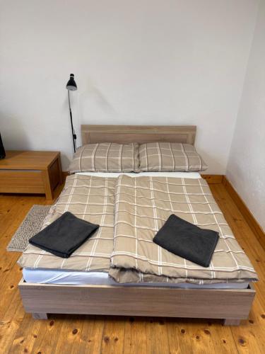 Giường trong phòng chung tại Centrum Brezno