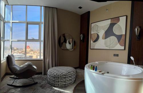 Et badeværelse på أجنحة أفق الفندقيه-Al Afaq Suites