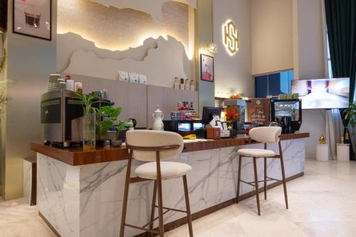 O bucătărie sau chicinetă la أجنحة أفق الفندقيه-Al Afaq Suites