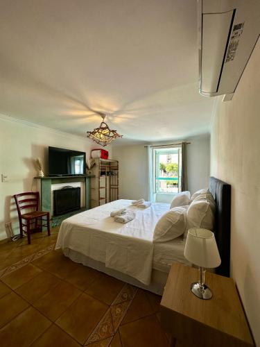 Giường trong phòng chung tại Casa Marelina - Maison de pêcheur port de Centuri