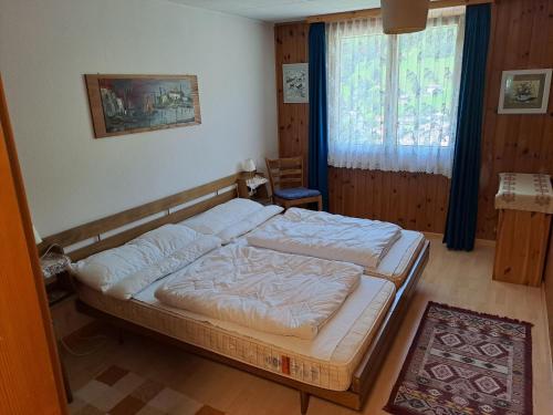 a bedroom with a large bed in a room at Apartment Bijou by Interhome in Alt Sankt Johann