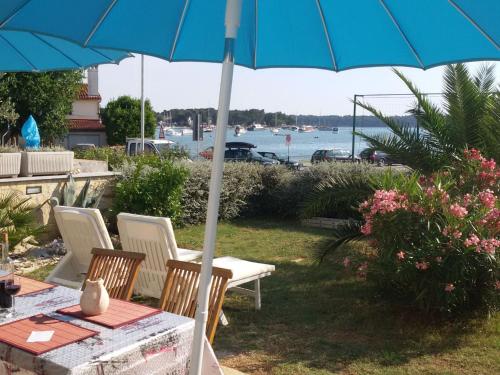 Apartment Direkt am Meer liegendes Apartment mit Garten by Interhome