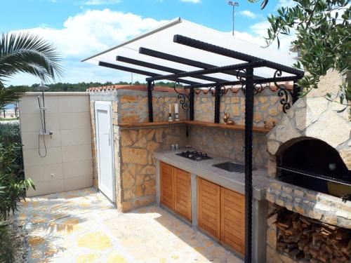 Apartment Direkt am Meer liegendes Apartment mit Garten by Interhome