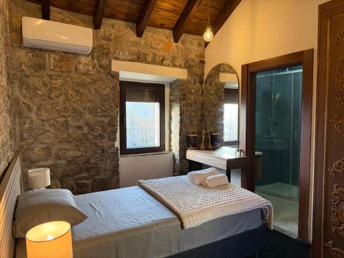 Postel nebo postele na pokoji v ubytování Villa Petra