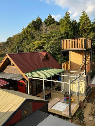 an overhead view of a house with a roof at 民泊の枠を超えた民泊セカンドライフ in Kashima