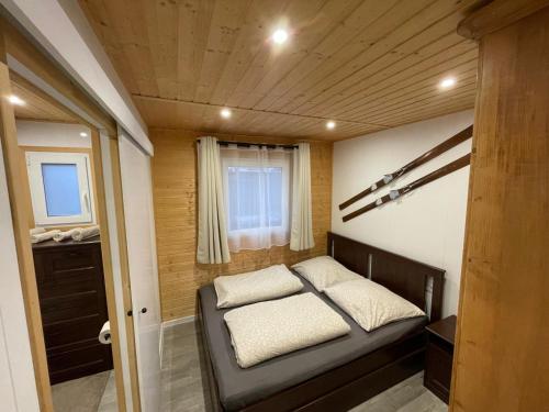 Ένα ή περισσότερα κρεβάτια σε δωμάτιο στο TinyHaus #4 Hülben - Ortsrand - kostenlose Parkplätze