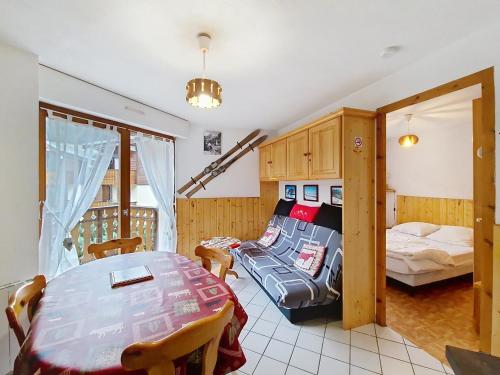 En eller flere senge i et værelse på Jonquilles JQM2 SUNNY & VIEW 4 pers