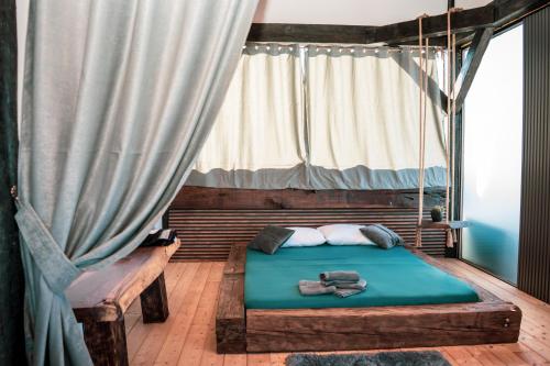 Ένα ή περισσότερα κρεβάτια σε δωμάτιο στο Apartmani Imamovic