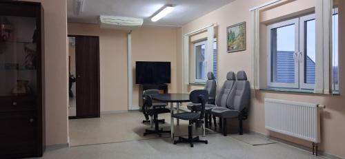 TV a/nebo společenská místnost v ubytování Jugata