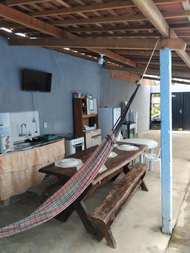 Et tv og/eller underholdning på Casa temporada Barra de Jequia-Al