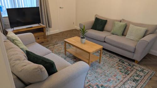 Χώρος καθιστικού στο Rooms at the Village