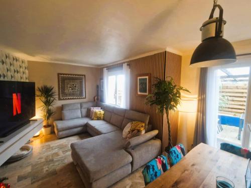 Coin salon dans l'établissement Maison TIKI TAHITI