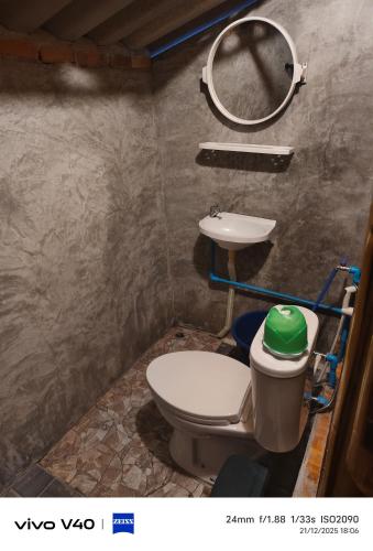 a bathroom with a toilet and a sink at Fa eap Bungalow in Ko Lanta Yai