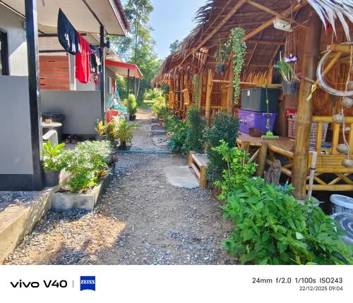 Ein Garten an der Unterkunft Fa eap Bungalow