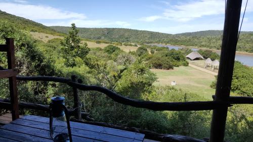 a view of a river from a porch with a view at Mansfield Private Reserve in Port Alfred