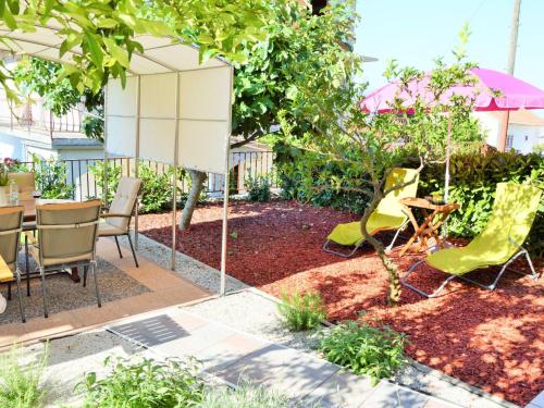Apartment Wohnung mit Grill- Terrasse und Garten by Interhome