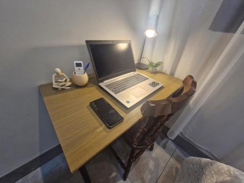 Et tv og/eller underholdning på Casa Alves Aluguel de Temporada Próx Hospital do Amor em Barretos SP Com Suíte e Ar condicionado