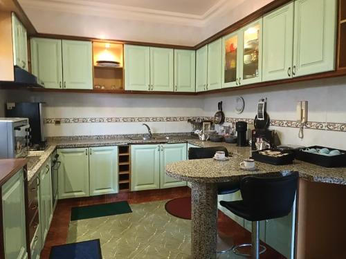 Køkken eller tekøkken på Villa stade Moulay Abdellah