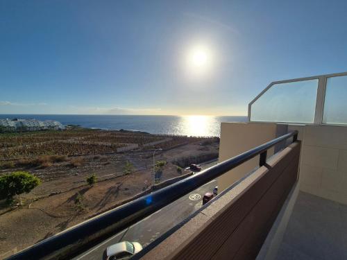 a view of the ocean from the balcony of a building at Paraiso View Duplex Penthouse in Callao Salvaje