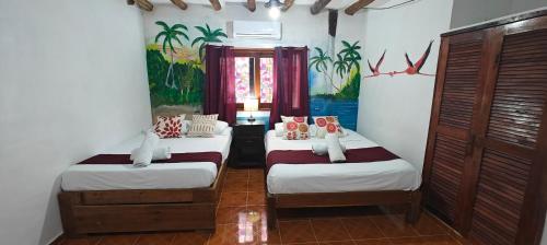 Ein Bett oder Betten in einem Zimmer der Unterkunft Casa Victor Avila