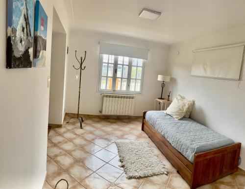 Postel nebo postele na pokoji v ubytování Las Margaritas