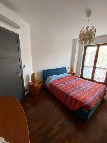 En eller flere senge i et værelse på Casa del Sole