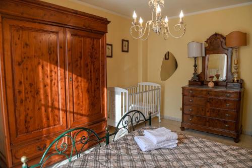 En eller flere senge i et værelse på Villetta i Nocetti