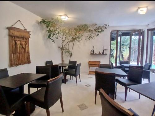 Een zitgedeelte bij Pousada Montblanc suíte 4