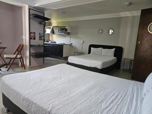 Un pat sau paturi într-o cameră la Singular Coyoacán Pepper My Love!