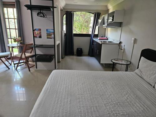 O bucătărie sau chicinetă la Singular Coyoacán Pepper My Love!