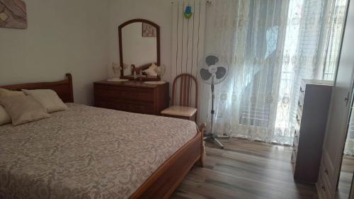 En eller flere senge i et værelse på La Casa di Marì