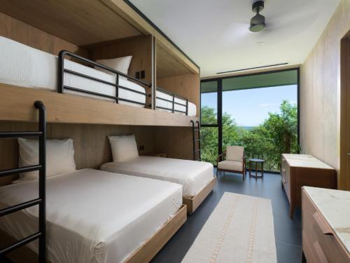 Postel nebo postele na pokoji v ubytování Villa Coral