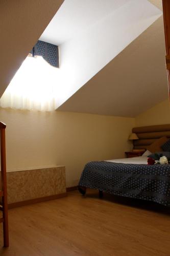 Hotel Cuatro Cañosにあるベッド