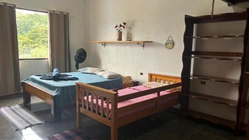 Een bed of bedden in een kamer bij Casa da Barra