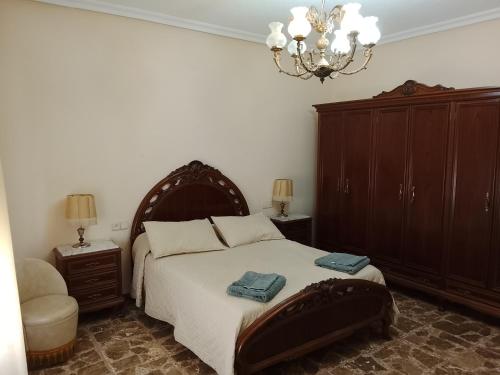 En eller flere senge i et værelse på Magdeleine Village