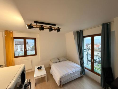 Postel nebo postele na pokoji v ubytování Studio Vernon 31