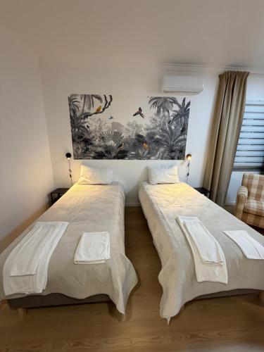 En eller flere senge i et værelse på Casa do Fidalgo