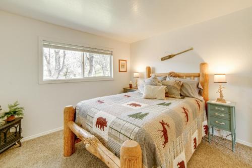 een slaapkamer met een bed en een raam bij 30-Acre Witter Springs Ranch with Barn and Views! in Upper Lake