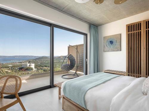 Postel nebo postele na pokoji v ubytování Himmel Villas - Seaview luxury & private pools