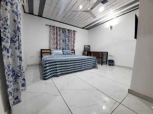 Giường trong phòng chung tại Nonkar Lodge & Food