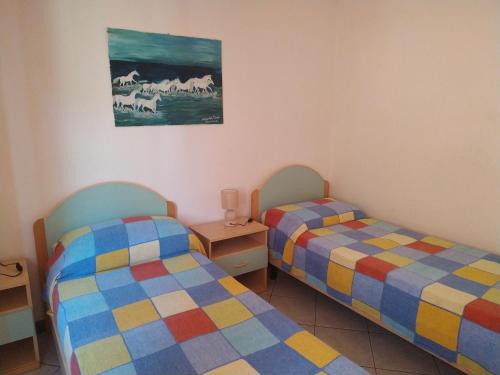 Een bed of bedden in een kamer bij Lungomare 2